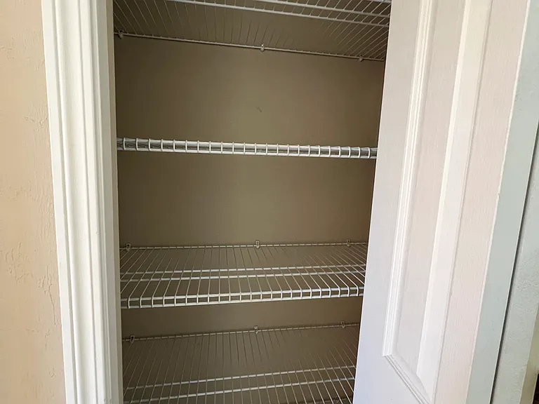 Linen closet in master bathroom