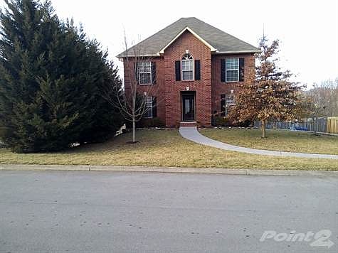 Brick home on a hill!