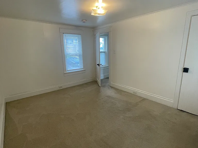 Fresh bedroom 2 with extra long closet.