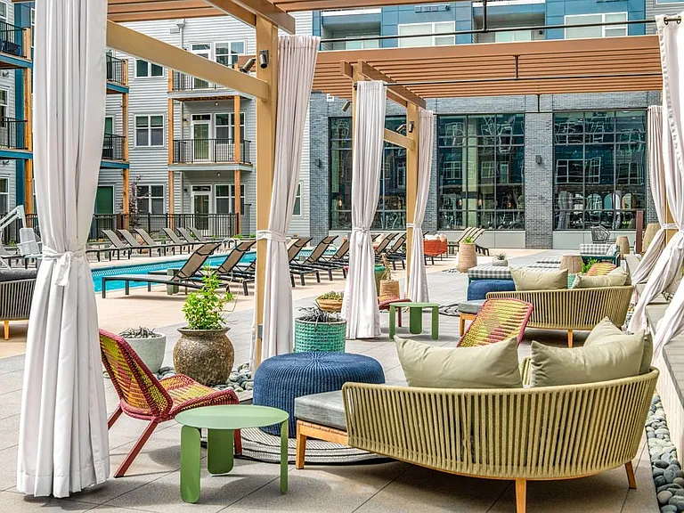 Pool and sundeck with cabanas