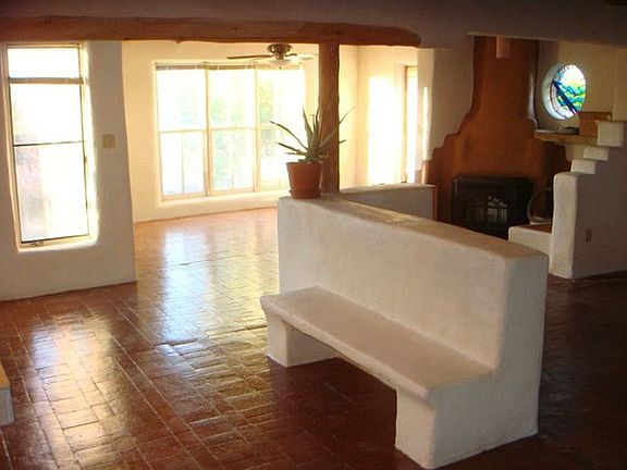 Another angle of dining and living area with built in bench.