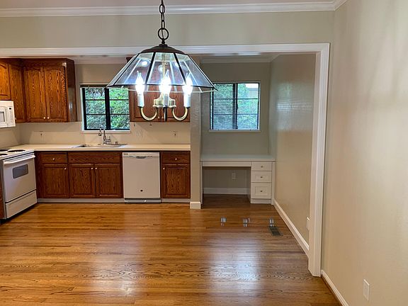 Large functional, clean kitchen with desk nook