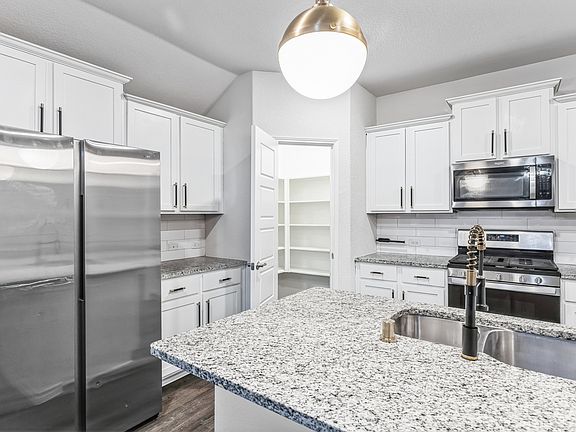 Look at those accent lights! This house is a VIBE.. LARGE PANTRY