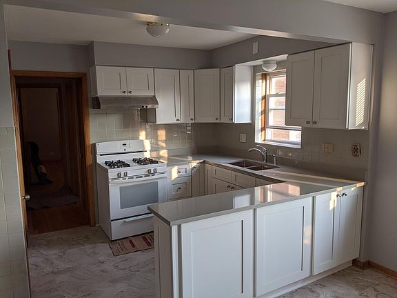 3rd image of 5934 N Mulligan Ave #1