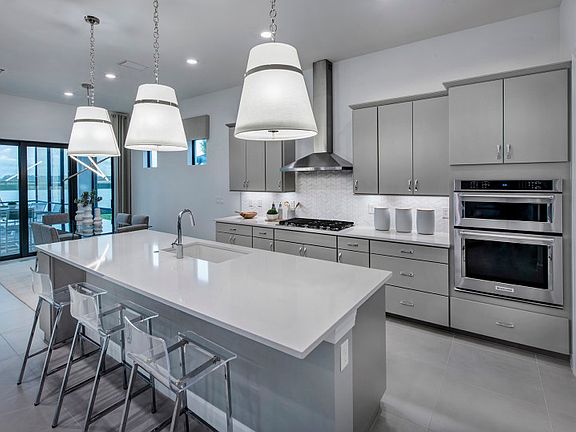 Model Representation -Thoughtfully designed kitchen with stainless steel appliances