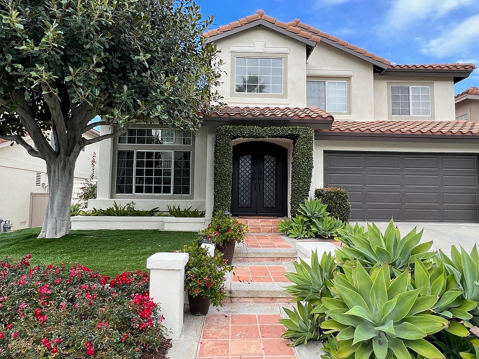 Custom doors, astroturf grass, gorgeous landscaping