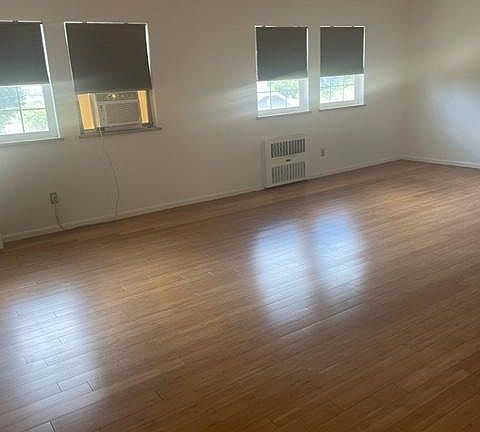 Great natural light, bamboo wood floors and, hot water radiant heat.