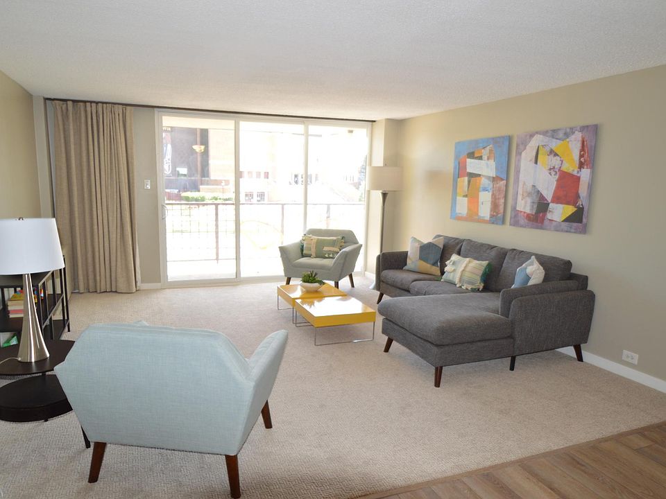 Living room with large sliding doors to balcony