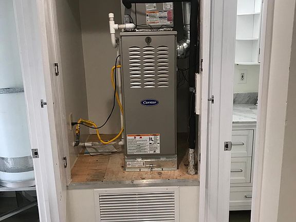 new forced air conditioning and heating unit