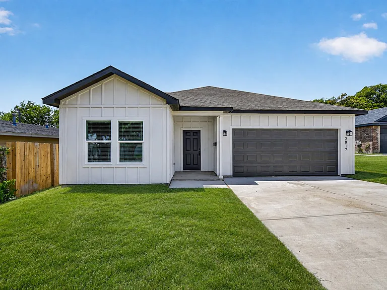 New home with driveway and 2 car garage
