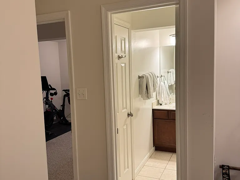 Basement bedroom to bathroom