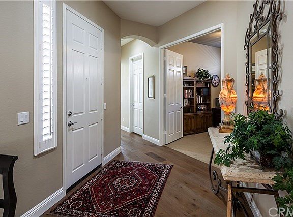 Bright Entry and Double-Door Entrance to Den/Office.