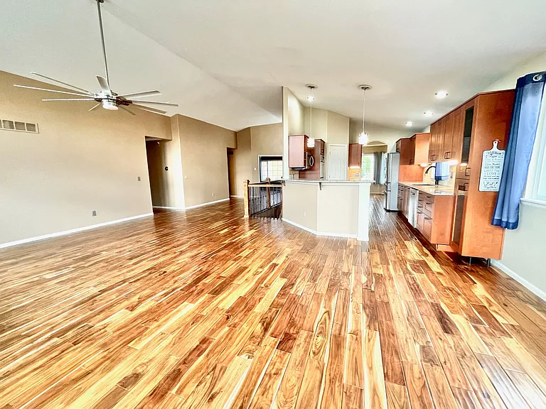 View toward front door/office/stairs from living area