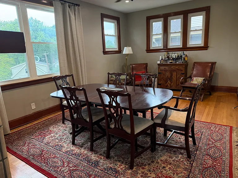 Spacious front room - flexible floorplan allows for use as living or dining room.