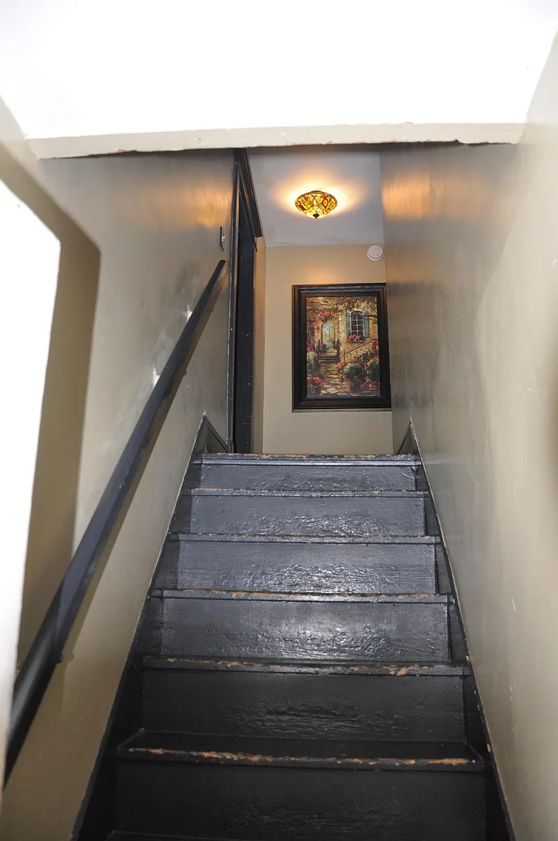 Stairway leading to apartment. - 206 S 7th St #2