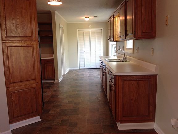 Kitchen with oak cabinets