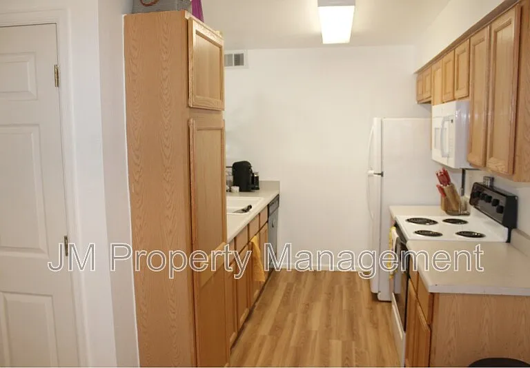 10784 W 63rd Pl — Photo 2