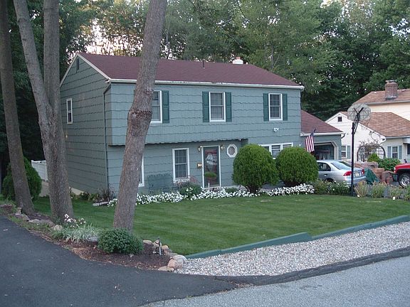 Front of House w/ lanscaping