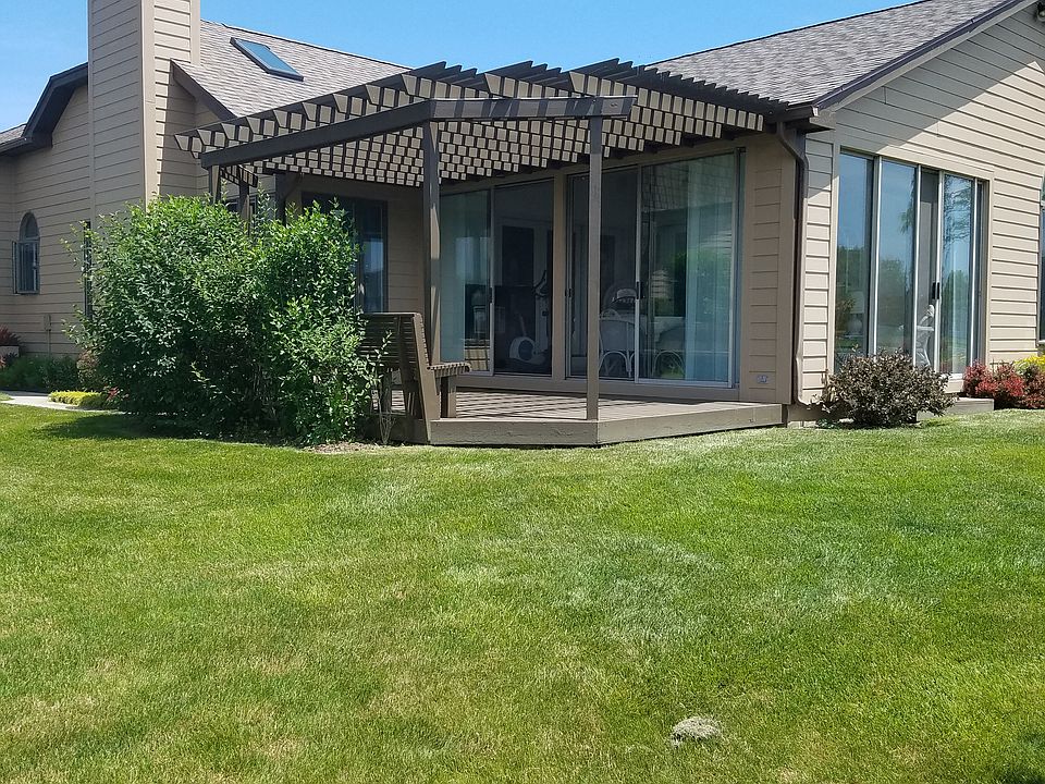 Shaded patio off of sunroom
