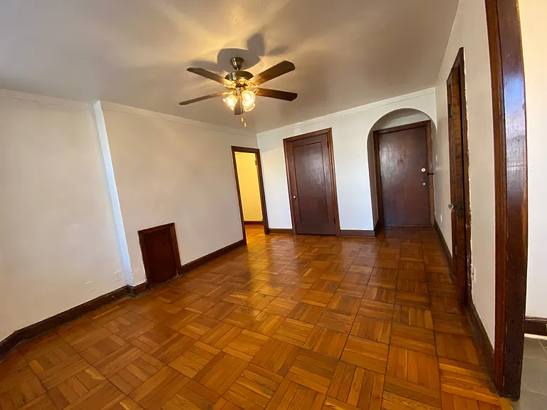 Main room has ceiling fan.