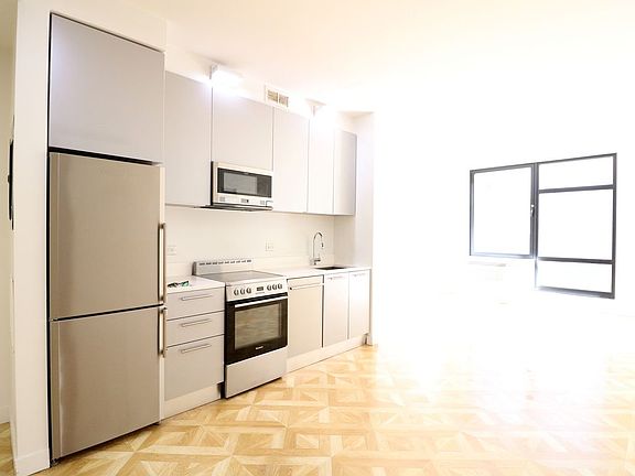 5th image of 316 E 3rd St APT 4D