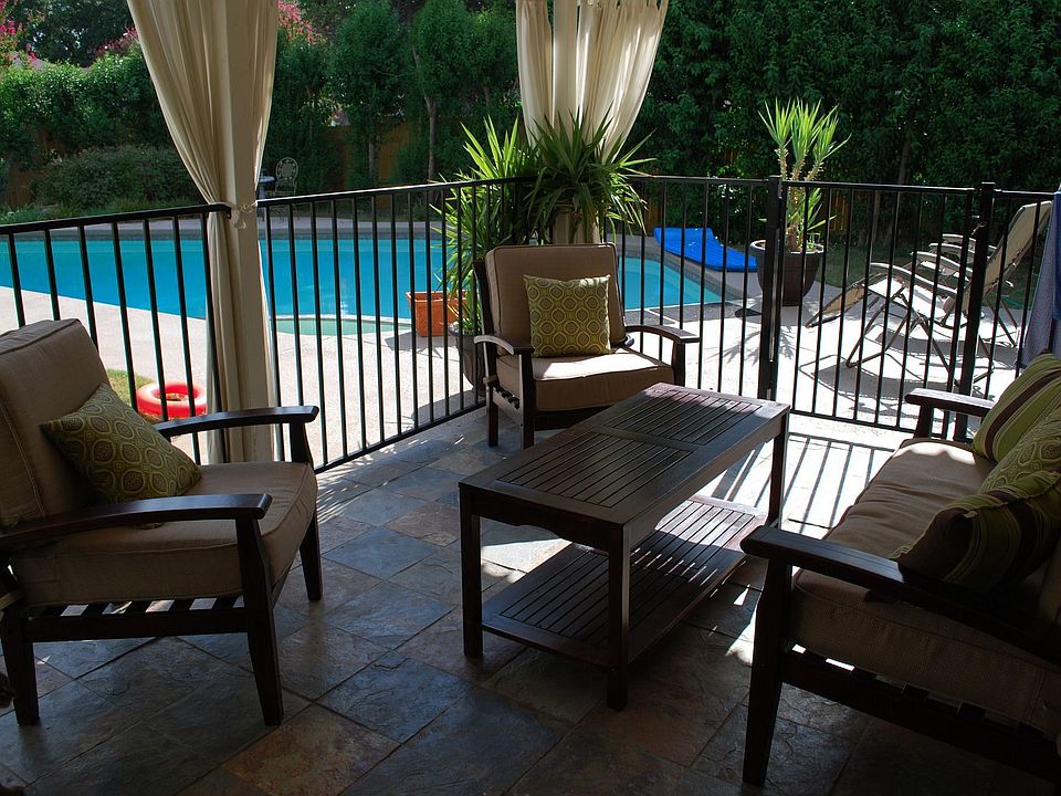 Updated saltwater pool and covered porch
