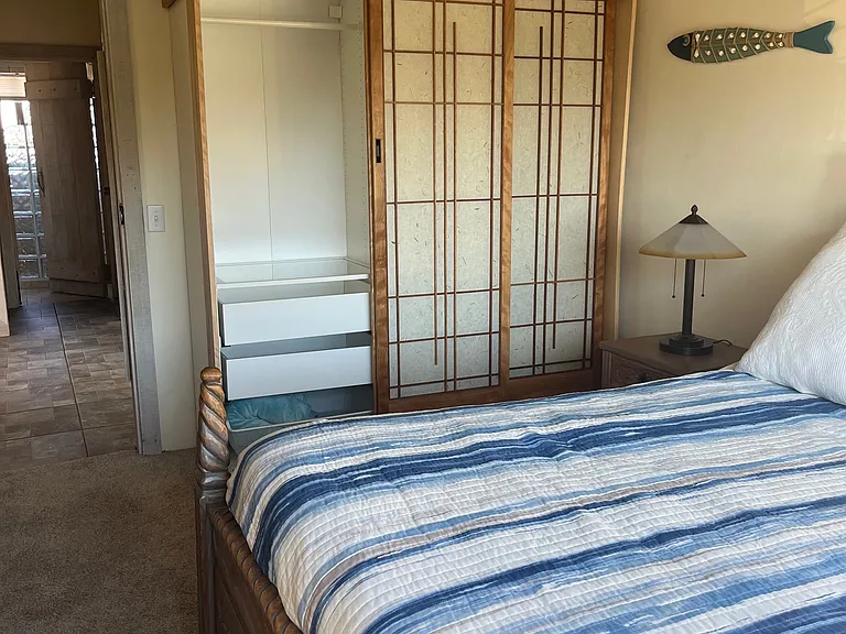Bedroom with closet with Shoji doors