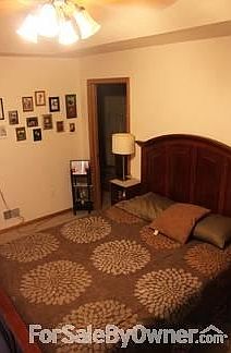 Master bedroom with tray ceiling