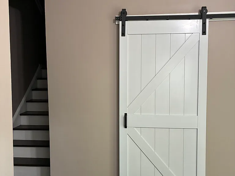 Study on first floor with barn door. Can be used as an additional guest room.