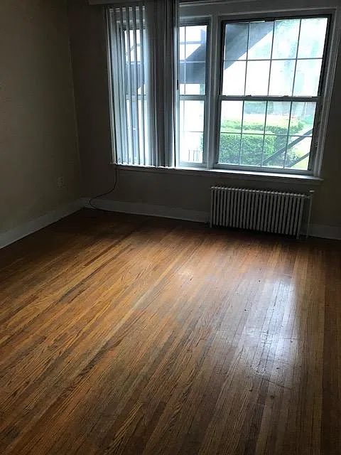 Hardwoods have been redone now with dark finish like that in Dining room