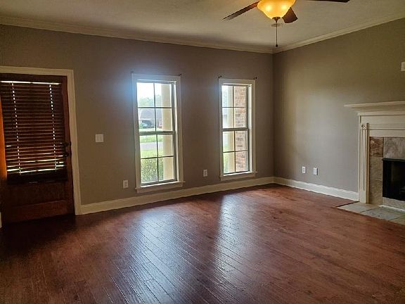 Double windows in Family Room. Front Door.