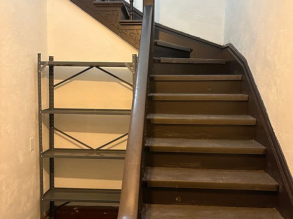 Hall leading to upstairs apartment