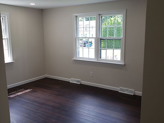 view of living room through kitchen doorway