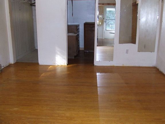The dining room features hardwood floors.