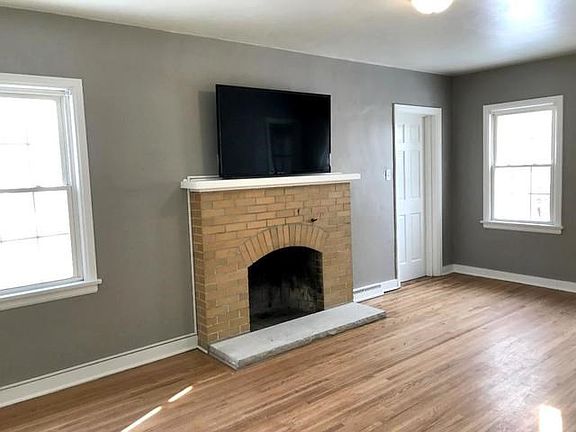 Living Room Offers Wood Burning Fireplace and NEW 55" TV!!