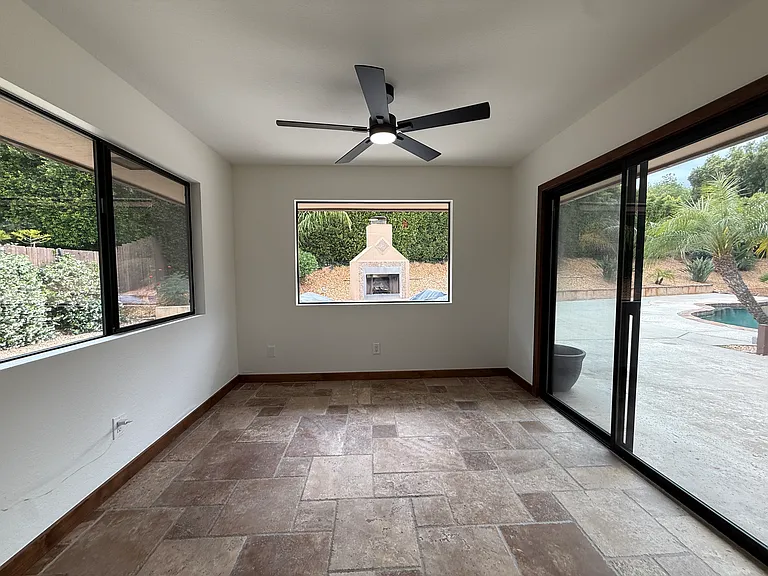 Breakfast nook off the kitchen with 3 windows giving you a full view of the pool and backyard!