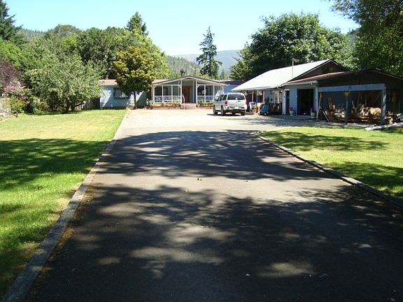 TWO HOMES ON .78 ACRE