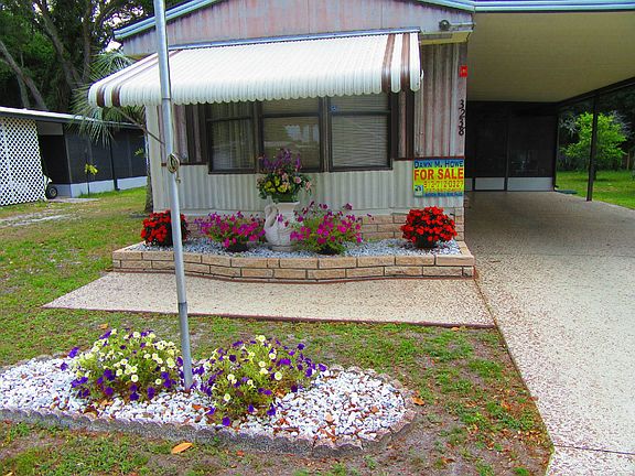 Flag Pole and Excellent Planting area in Front
