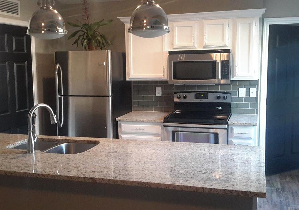 granite counters, stainless M/W & self-clean oven