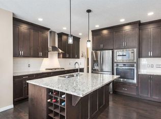 26 W Mount Rae Ter, Okotoks, AB T1S0M6