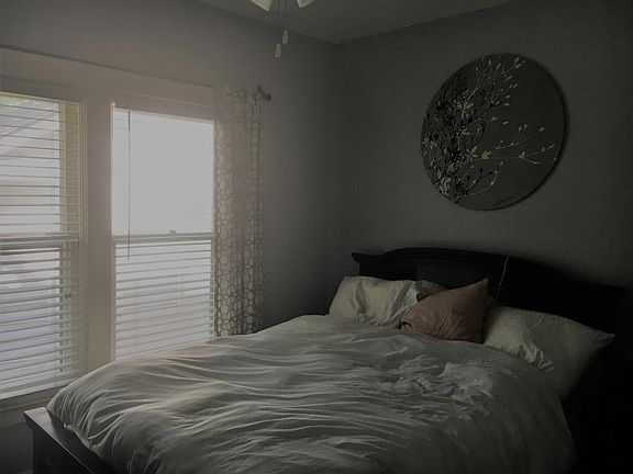 Bedroom with queen bed.