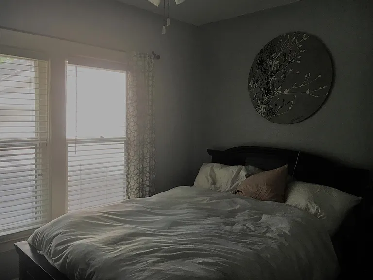 Bedroom with queen bed.