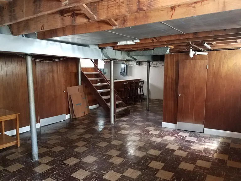 Partially finished Basement with Half Bath and Bar