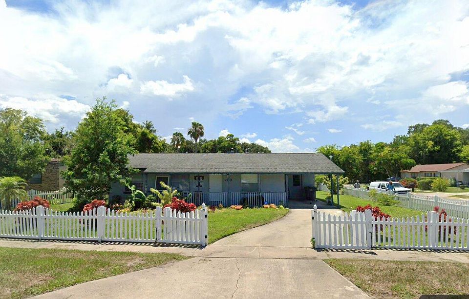 Front of home with carport