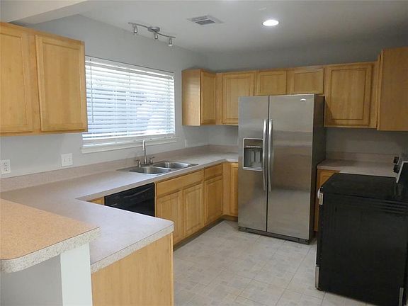 Wonderful large kitchen with full sized appliances. Lots of cabinet and counter space.