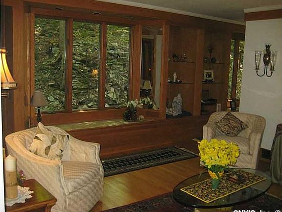 Living Room. Great place for intimate chats and visiting friends. Large windows bring in the outside.