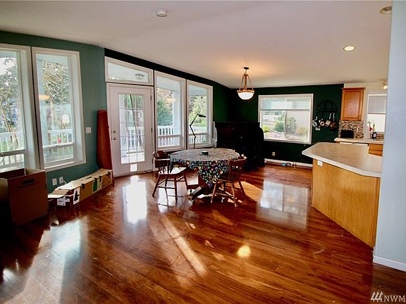 Large windows allow plenty of natural light to fill these rooms.