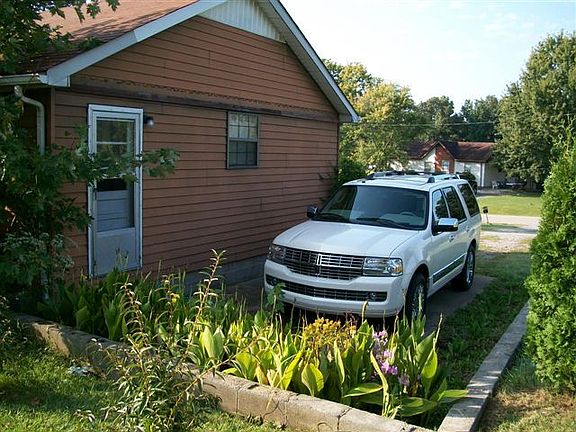 Side Door opens up to the Utlilty Room & Kitchen