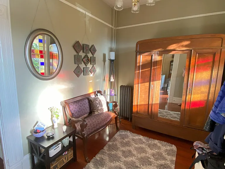 Sun drenched den that a desk could be added to for office space
