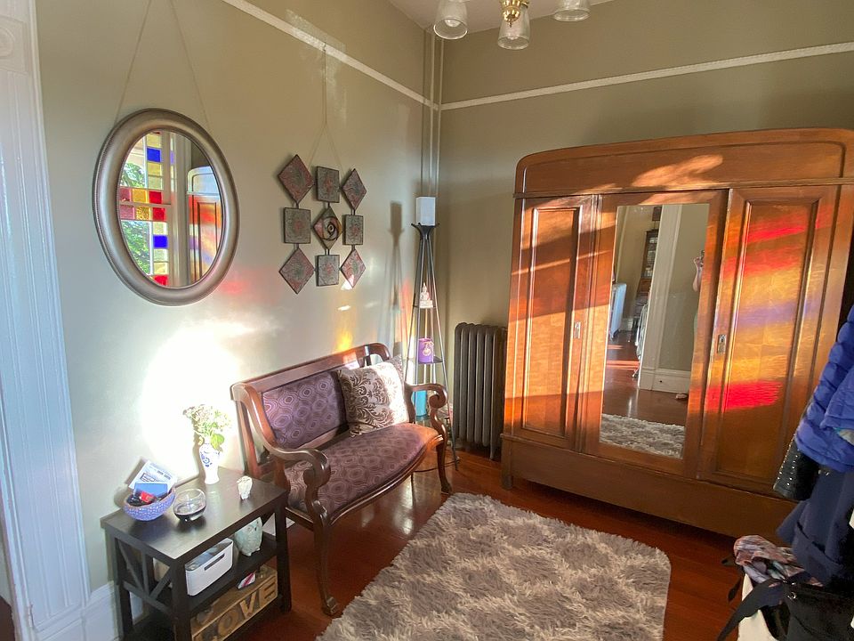 Sun drenched den that a desk could be added to for office space
